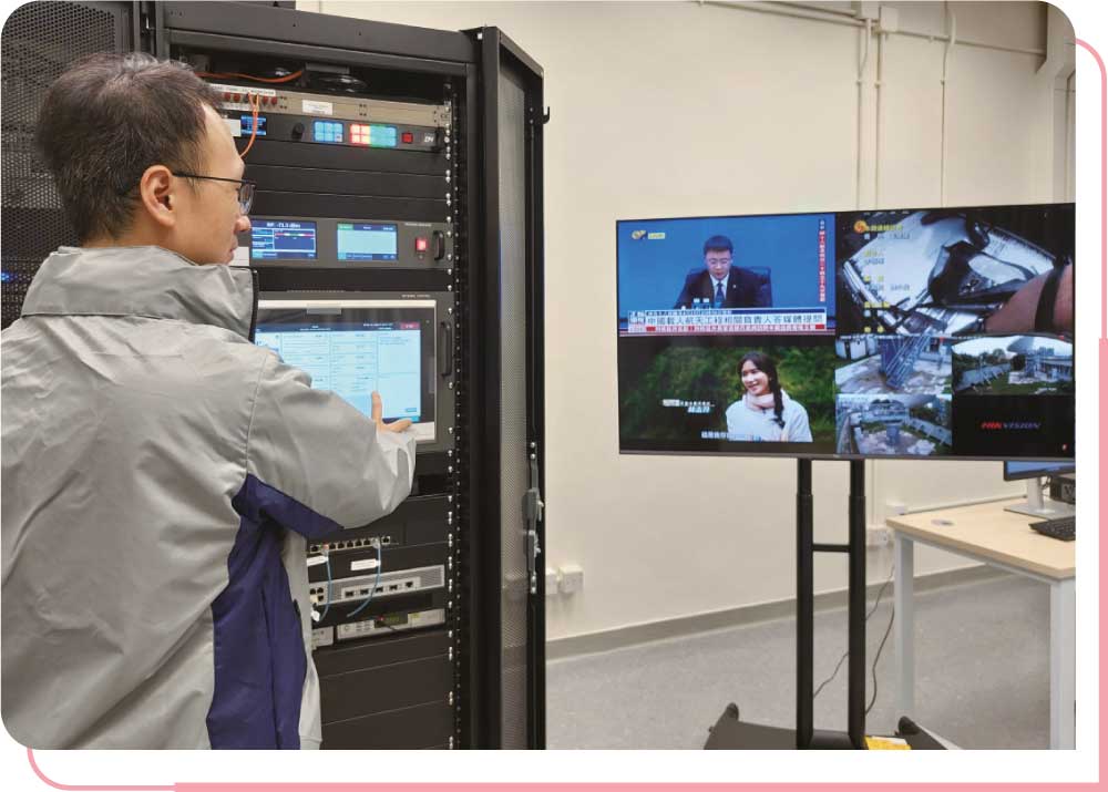 A staff member of OFCA using a satellite broadcast monitoring system to monitor receivable satellite television signals in Hong Kong.